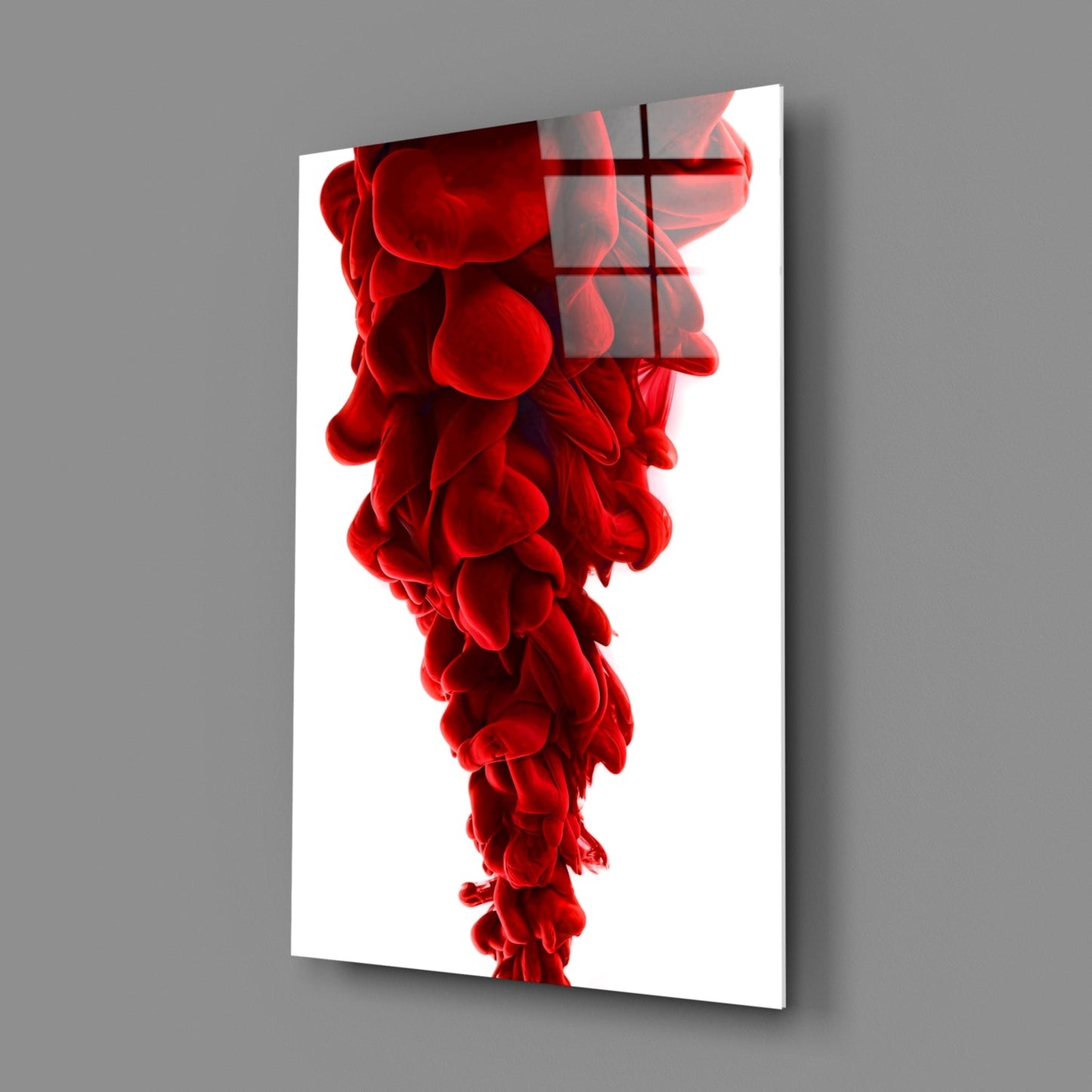 Red Layers Glass Wall Art displayed at an angle showing translucent red fluid forms with a geometric cross overlay on white background.