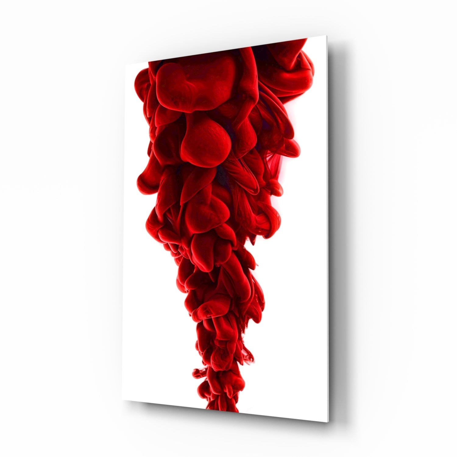 Red layered glass wall art with vertical teardrop shape displaying translucent red sculptural forms on white background.