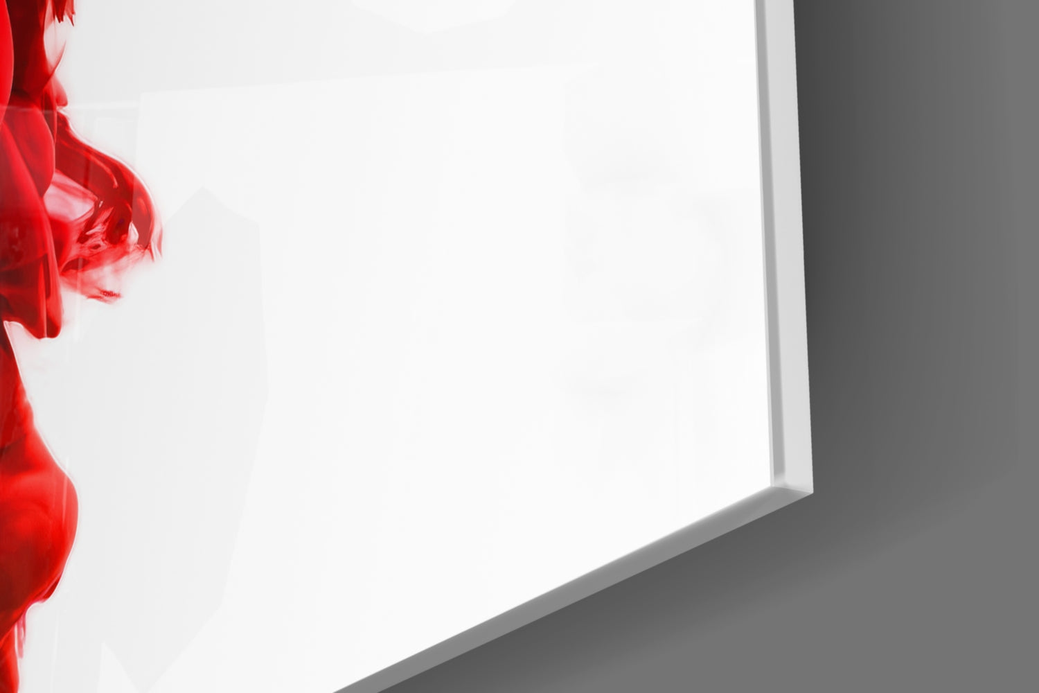 Red layered glass wall art panel with white center and dark gray wall background, angled perspective view.