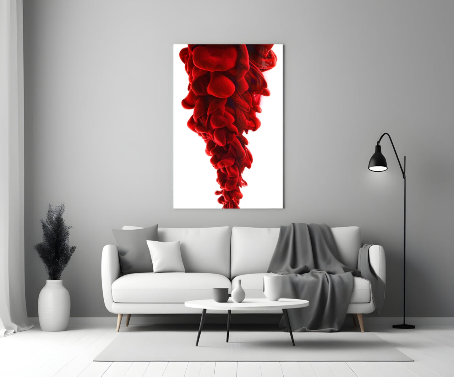 Red Layers Glass Wall Art displayed above a white sofa in a minimalist living room interior.