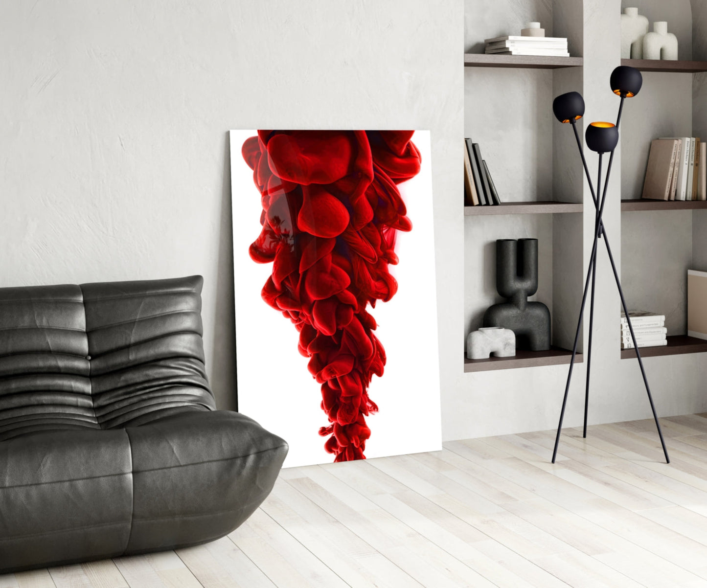 Red Layers Glass Wall Art displayed in modern living room with gray sofa, black floor lamp, and wall shelving.