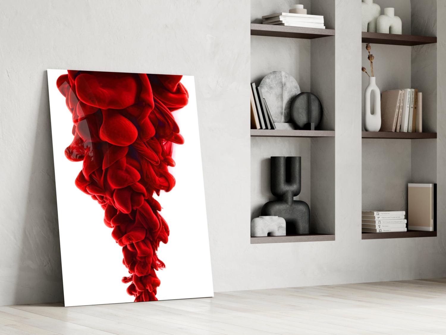 Red Layers Glass Wall Art leaning against white wall beside shelving unit displaying decorative objects and books.