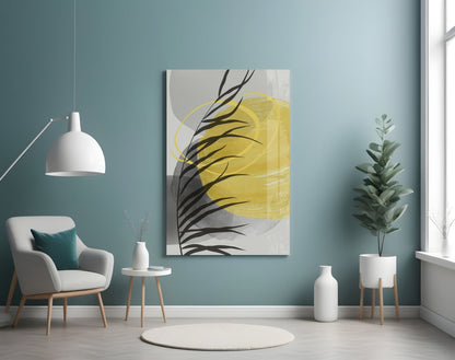 Modern living room with teal walls featuring Autumn Yellow Glass Wall Art displaying yellow and black botanical design above white furniture.