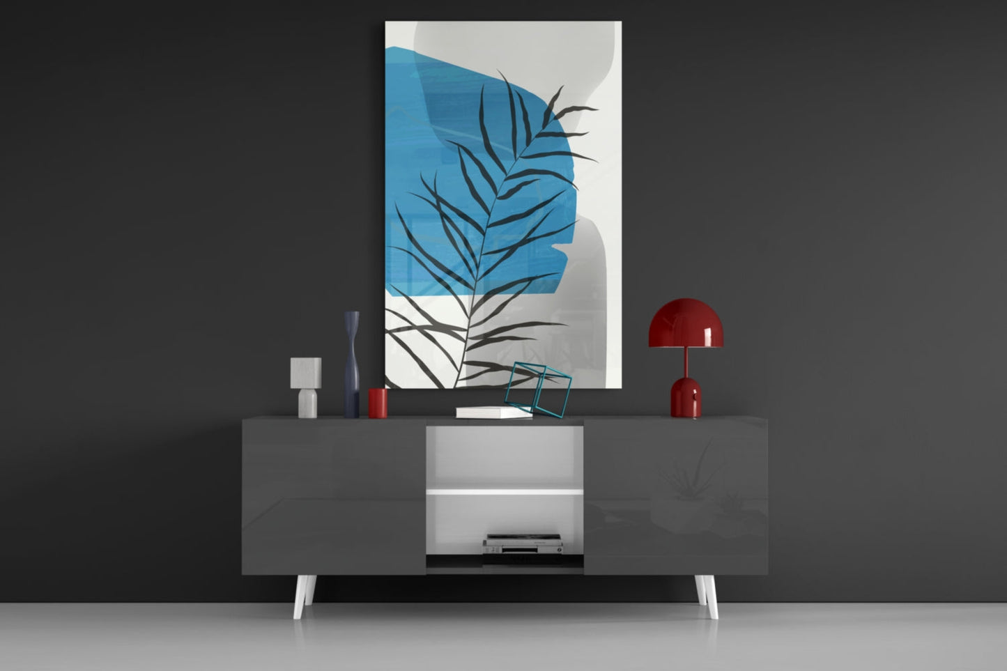 Autumn Blue Glass Wall Art displayed above a dark grey media console with red decorative lamps and accessories in a modern interior setting.