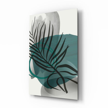 Angled side view of glass wall art featuring dark botanical lines overlaying layered teal and gray abstract shapes on cream background.