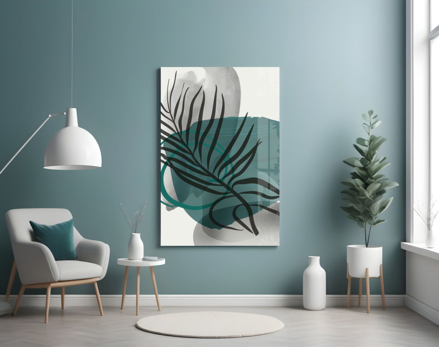 Modern living room with teal wall displaying abstract botanical glass art featuring black leaf lines and teal watercolor shapes.