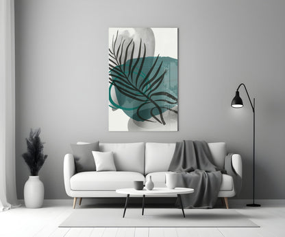 Autumn Green Glass Wall Art displayed above a white sofa in a modern living room with teal and black botanical design.
