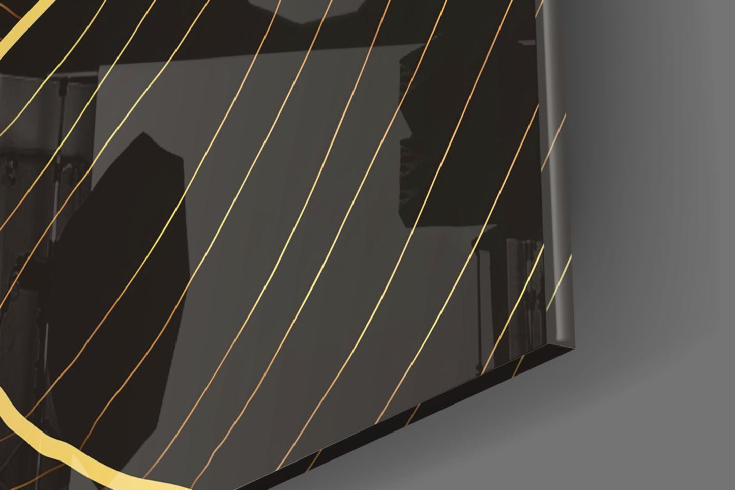 Close-up detail of layered glass panels with gold and bronze striping creating dimensional shadow effects against dark background.