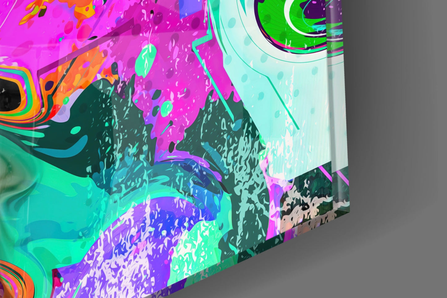 Angled side view of vibrant glass wall art featuring neon magenta, cyan, green, and purple abstract patterns with textured surfaces against gray background.