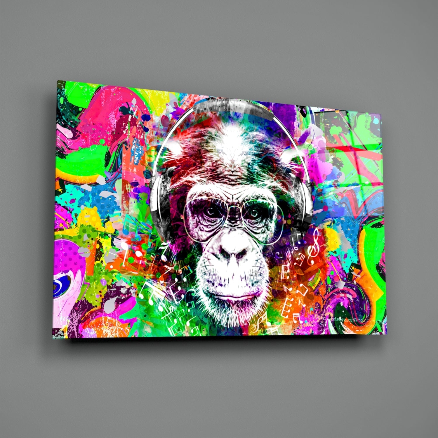 Vibrant glass wall art featuring a monkey wearing headphones centered against a multicolored abstract background with musical notes and splatter patterns.
