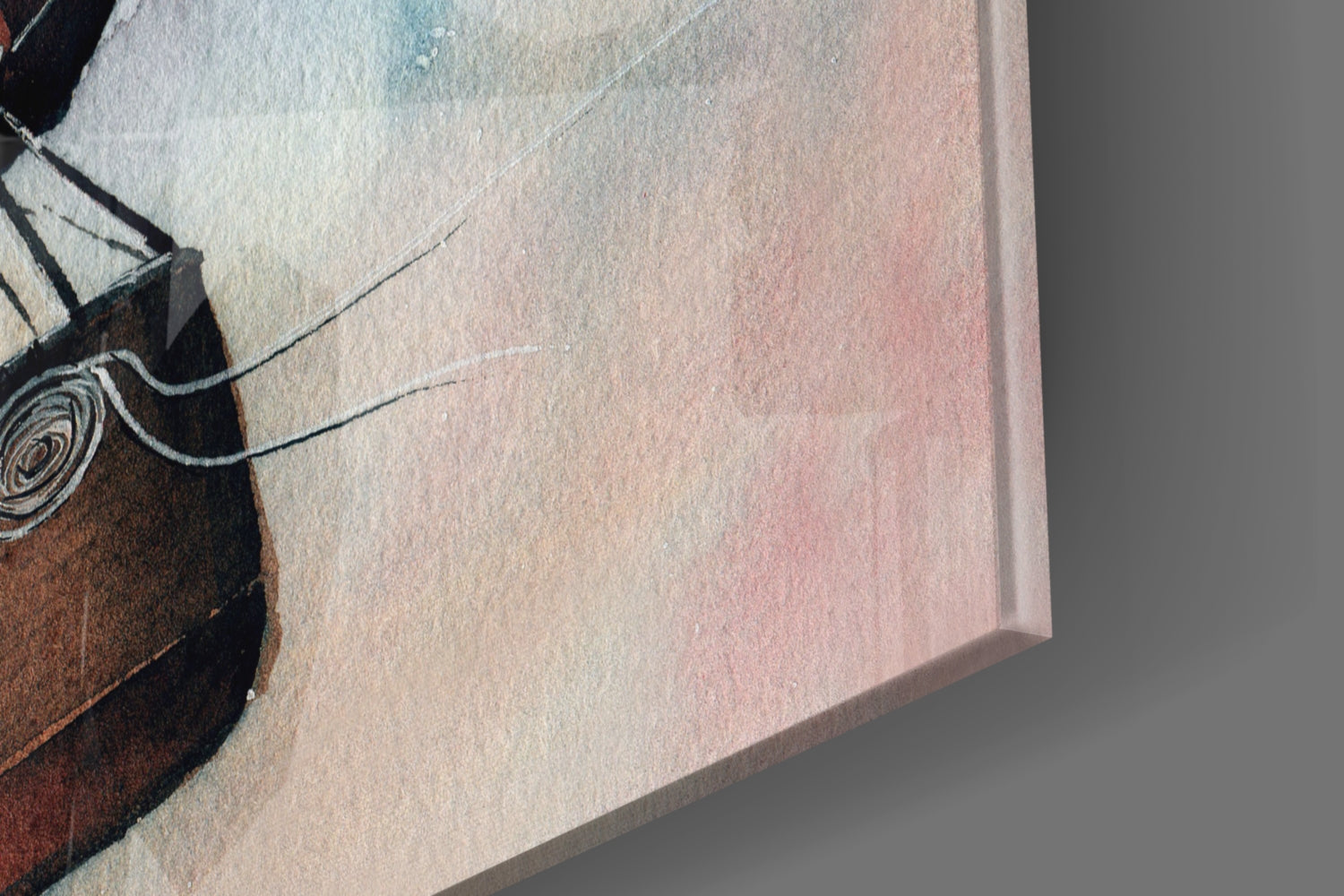 Close-up edge view of glass wall art showing layered watercolor tones from brown to pink with decorative line details.