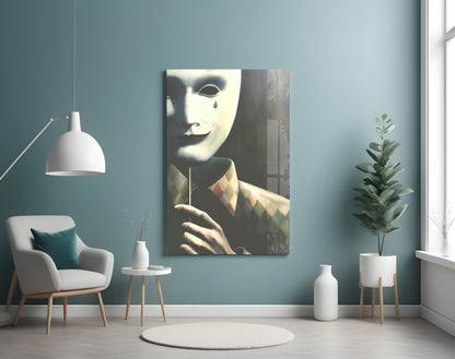 Glass wall art depicting a pale masked face with a tear drop displayed in a teal room with chair and plants.