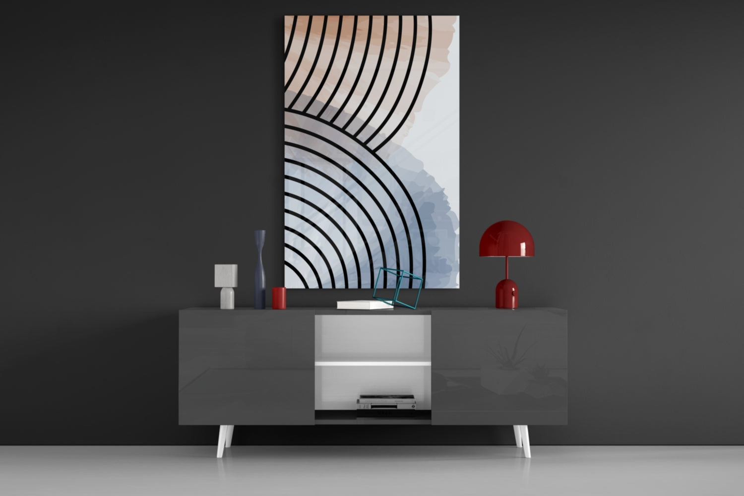 Modern media console with geometric wave pattern glass art above, flanked by red table lamps and decorative objects.
