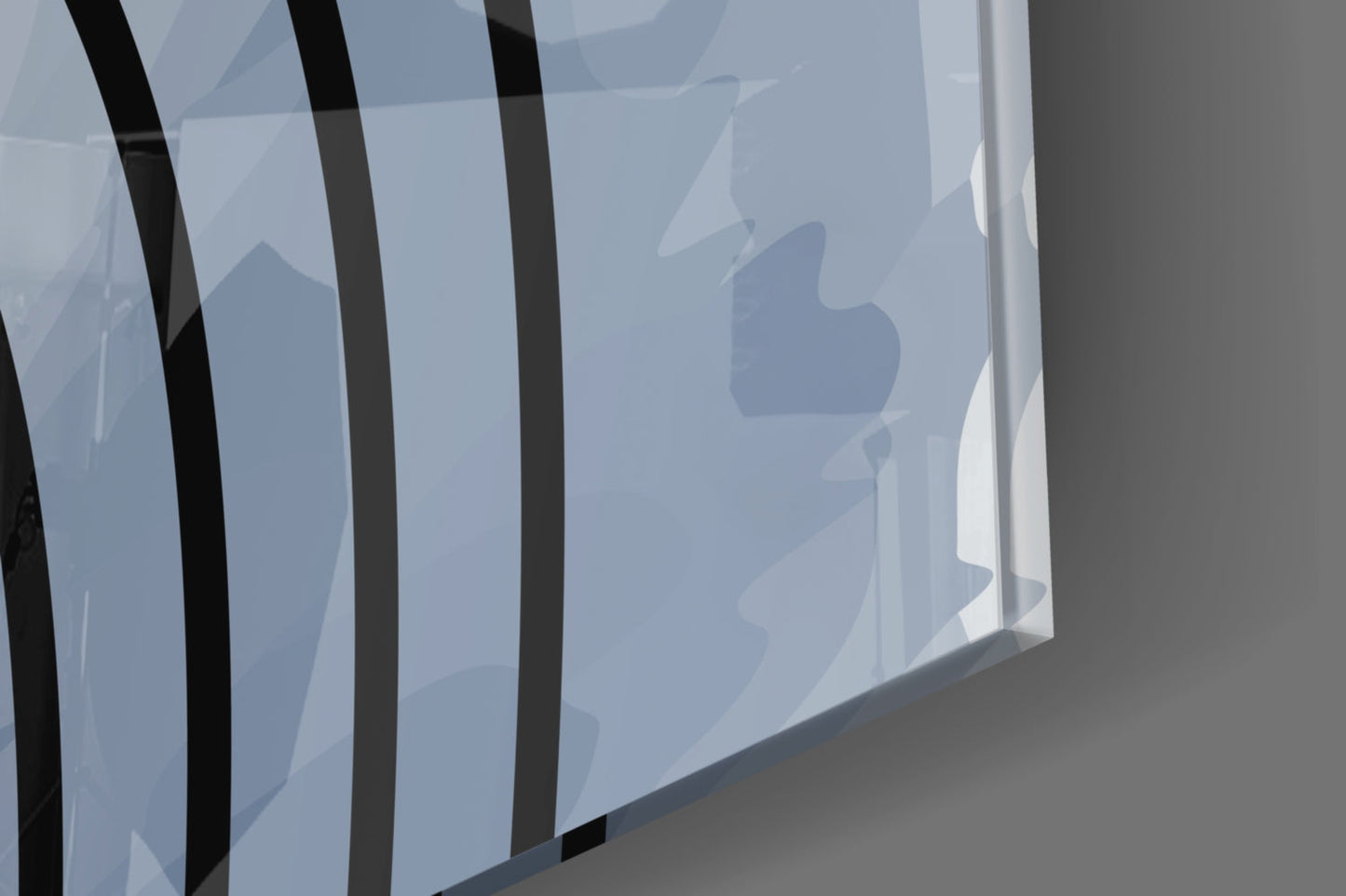 Close-up angled view of frosted glass wall art with black vertical lines and layered wave patterns in blue and white tones.