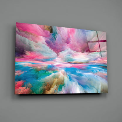 Colorful glass wall art panel mounted on gray wall displaying swirling pink, blue, and turquoise abstract landscape composition.