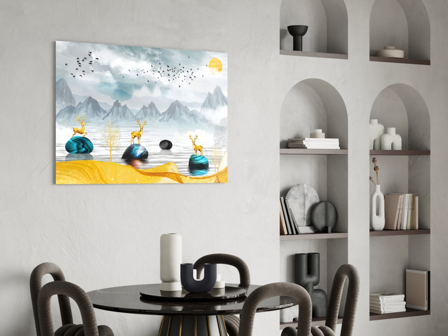 Glass wall art depicting golden deer, blue mountains, yellow foreground, and flying birds displayed above a black dining table in a modern interior.