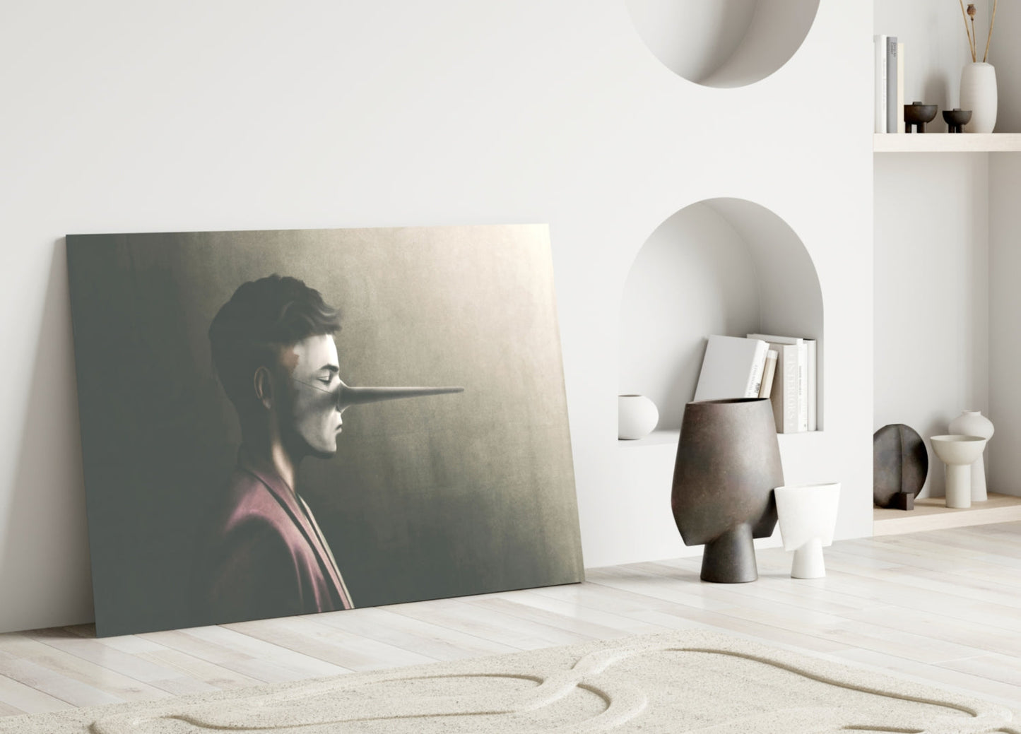Glass wall art depicting a profile of a man with an elongated nose, displayed leaning against a white wall in a minimalist interior setting.
