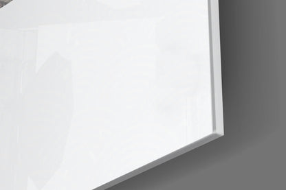 Close-up angled view of a white glass panel with beveled edge against gray background, showing glossy surface and dimensional depth.
