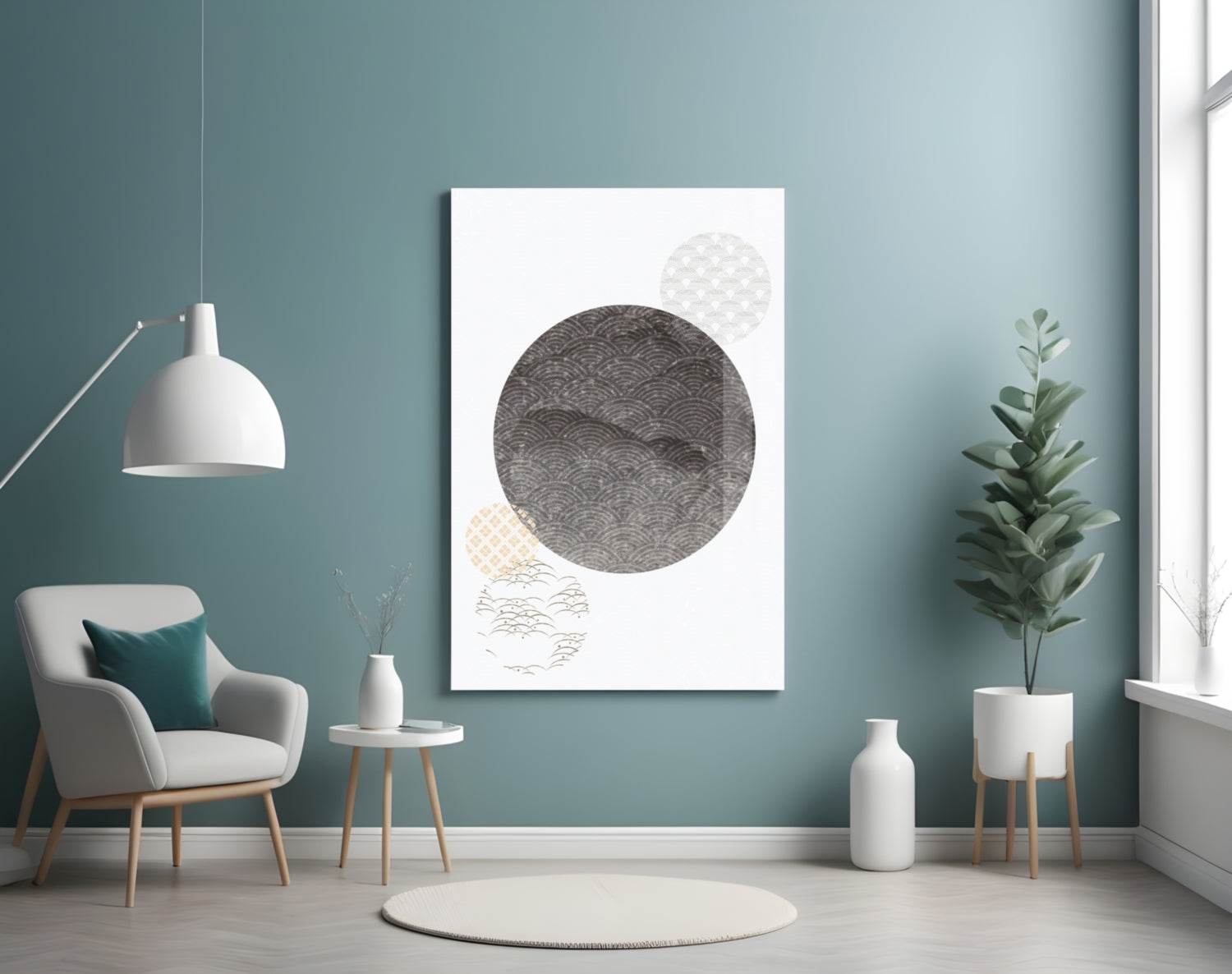 Black Moon Glass Wall Art displayed on teal bedroom wall above white chair, featuring dark patterned circle with lighter geometric circles below.