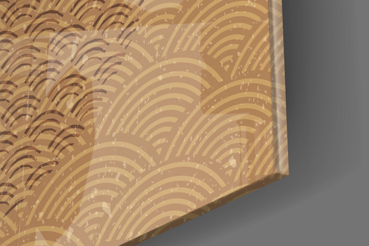 Close-up angled view of glass art showing concentric curved lines in gold, tan, and brown tones with subtle white highlights.