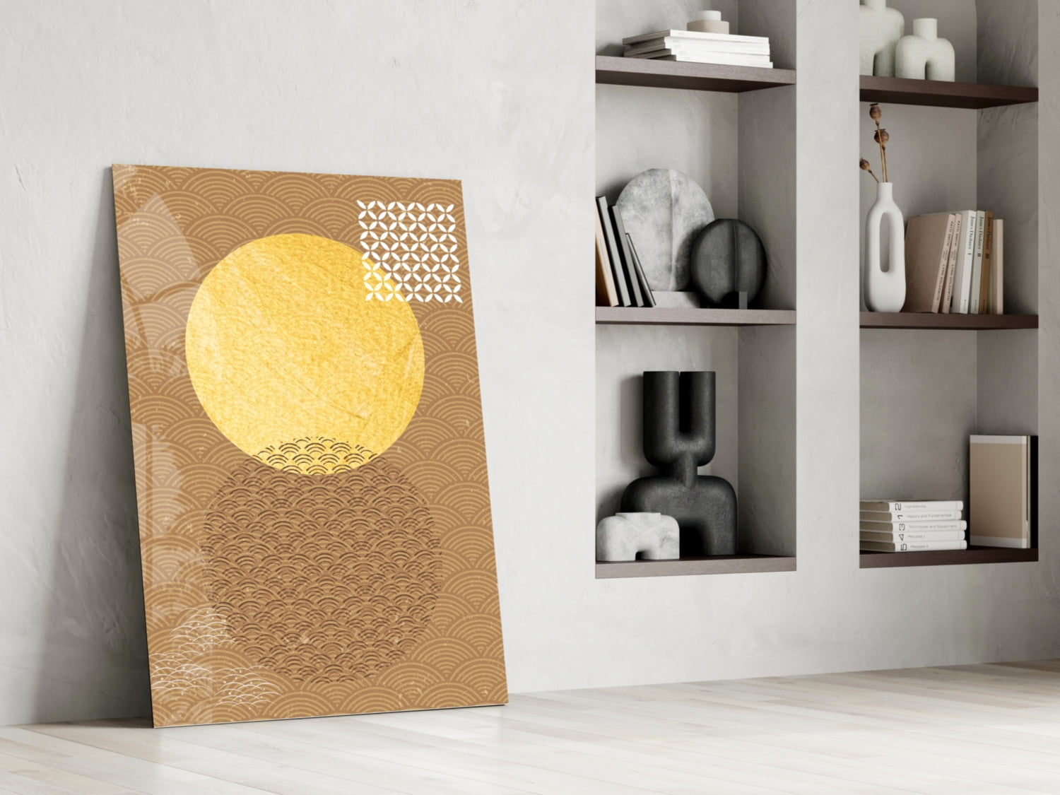 Leaning glass wall art displaying a large yellow circle on tan patterned background, positioned against white wall with wooden shelving.
