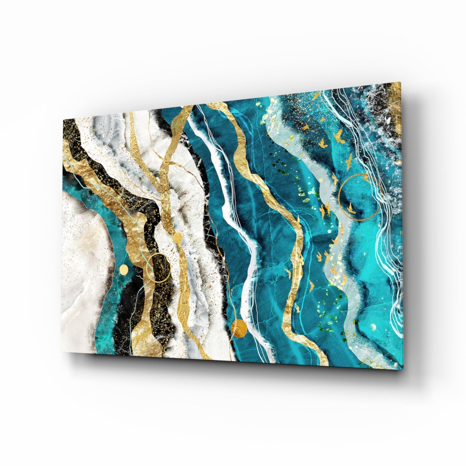 Angled perspective view of glass wall art featuring turquoise, gold, and white marbled wave patterns with black accents.