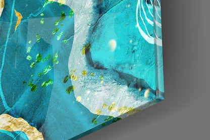 Close-up angled view of turquoise glass wall art with layered blue tones, gold accents, and white wave details.