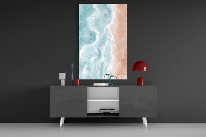 Beach Glass Wall Art depicting turquoise waves and sandy shore displayed above modern gray sideboard with red accents.