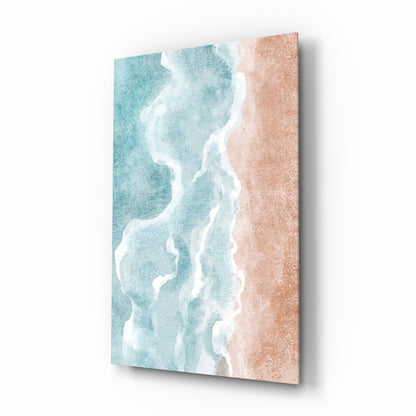 Angled three-quarter view of a canvas wall art depicting turquoise ocean waves with white foam meeting a sandy beach shore.