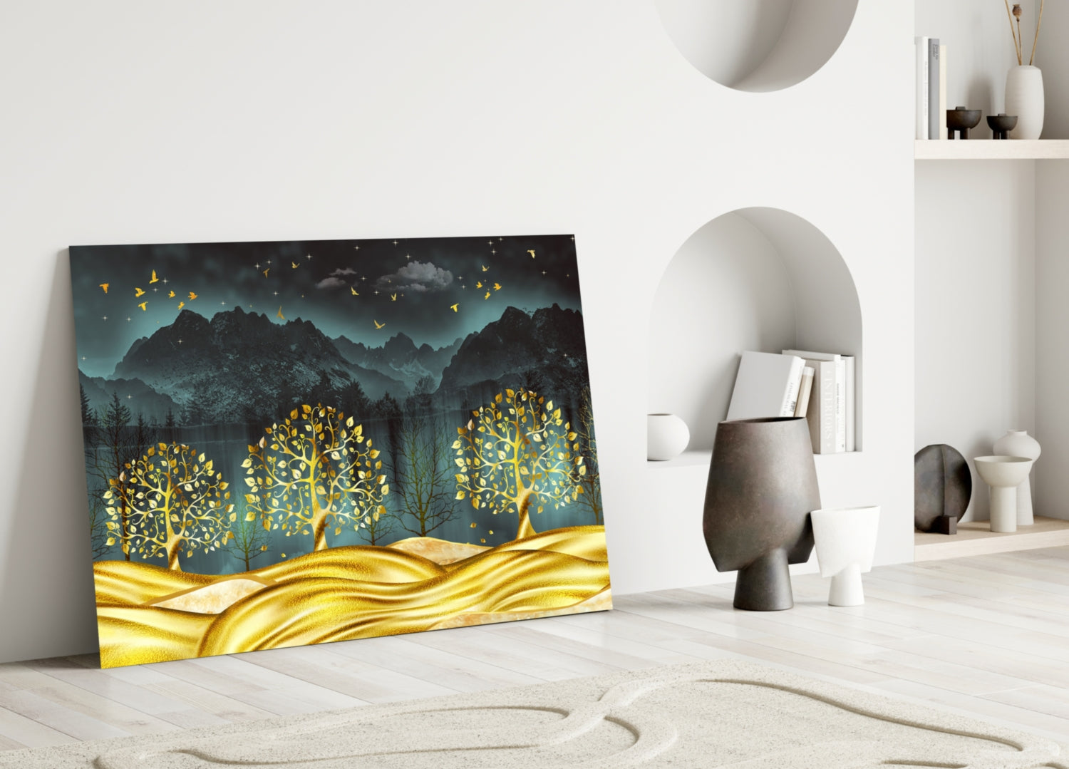 Golden Forest Glass Wall Art leaning against white wall in minimalist room with shelving and decorative objects.