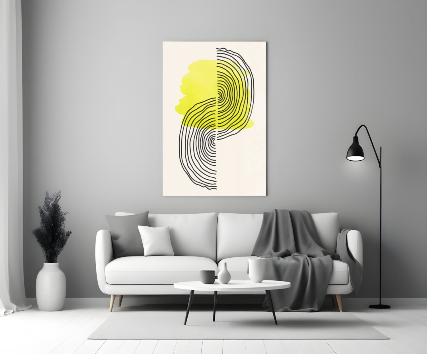 Abstract Sun Glass Wall Art with yellow and black concentric lines displayed above a white sofa in a modern living room.