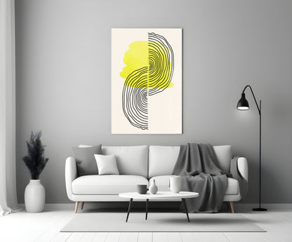 Abstract Sun Glass Wall Art with yellow and black concentric lines displayed above a white sofa in a modern living room.
