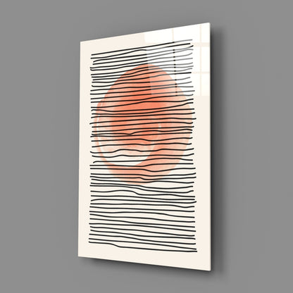 Abstract Sunset Glass Wall Art displayed at an angle showing coral-orange horizontal brushstrokes against black wavy lines on cream background.