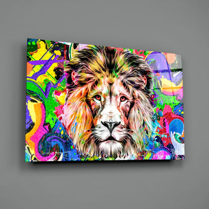 Colorful glass wall art featuring a lion's face with vibrant neon background patterns, displayed at an angle against gray wall.