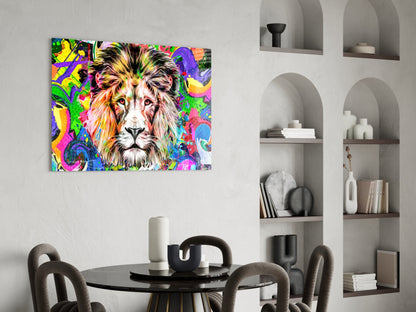 Colorful pop art lion portrait with vibrant rainbow background displayed on white wall above black dining table.