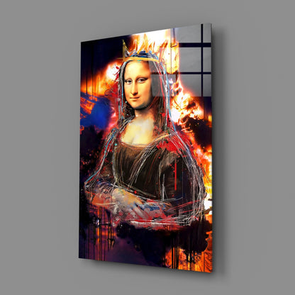 Angled perspective view of glass wall art featuring Mona Lisa with fiery orange and red flames backdrop and white line overlay details.