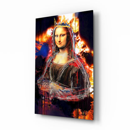 Angled perspective view of glass wall art featuring Mona Lisa with crown, fiery orange and blue background effects, and white linear overlay details.