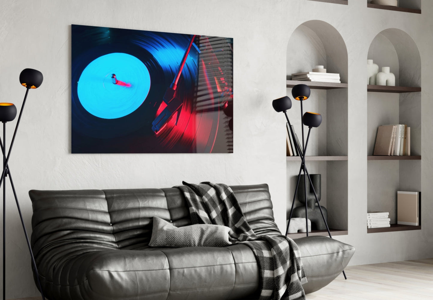 Modern living room with neon gramophone glass wall art displaying cyan circle and red vinyl record above gray leather sofa.