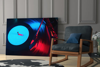 Gramophone glass wall art displayed in modern living room, featuring cyan vinyl record and red tonearm against dark background.
