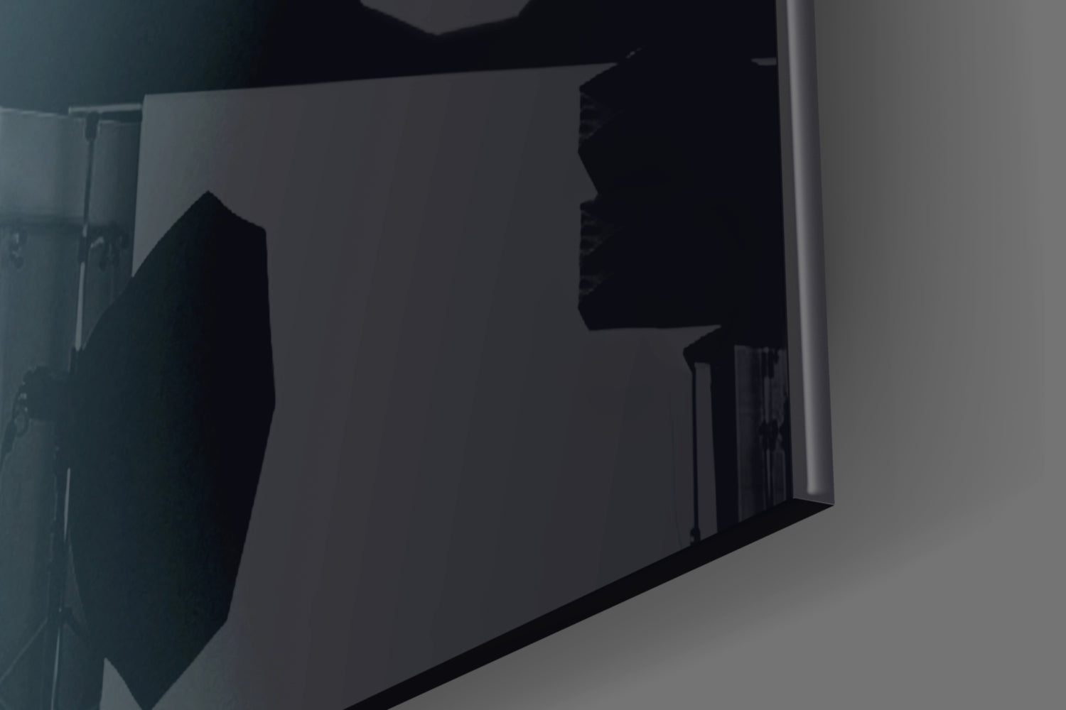 Silhouette view of Golden Lips Glass Wall Art mounted on gray wall in dimly lit interior space.