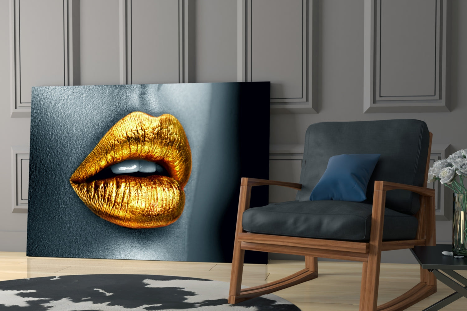 Golden Lips Glass Wall Art displayed in modern living room with mid-century wooden chair and gray paneled wall.