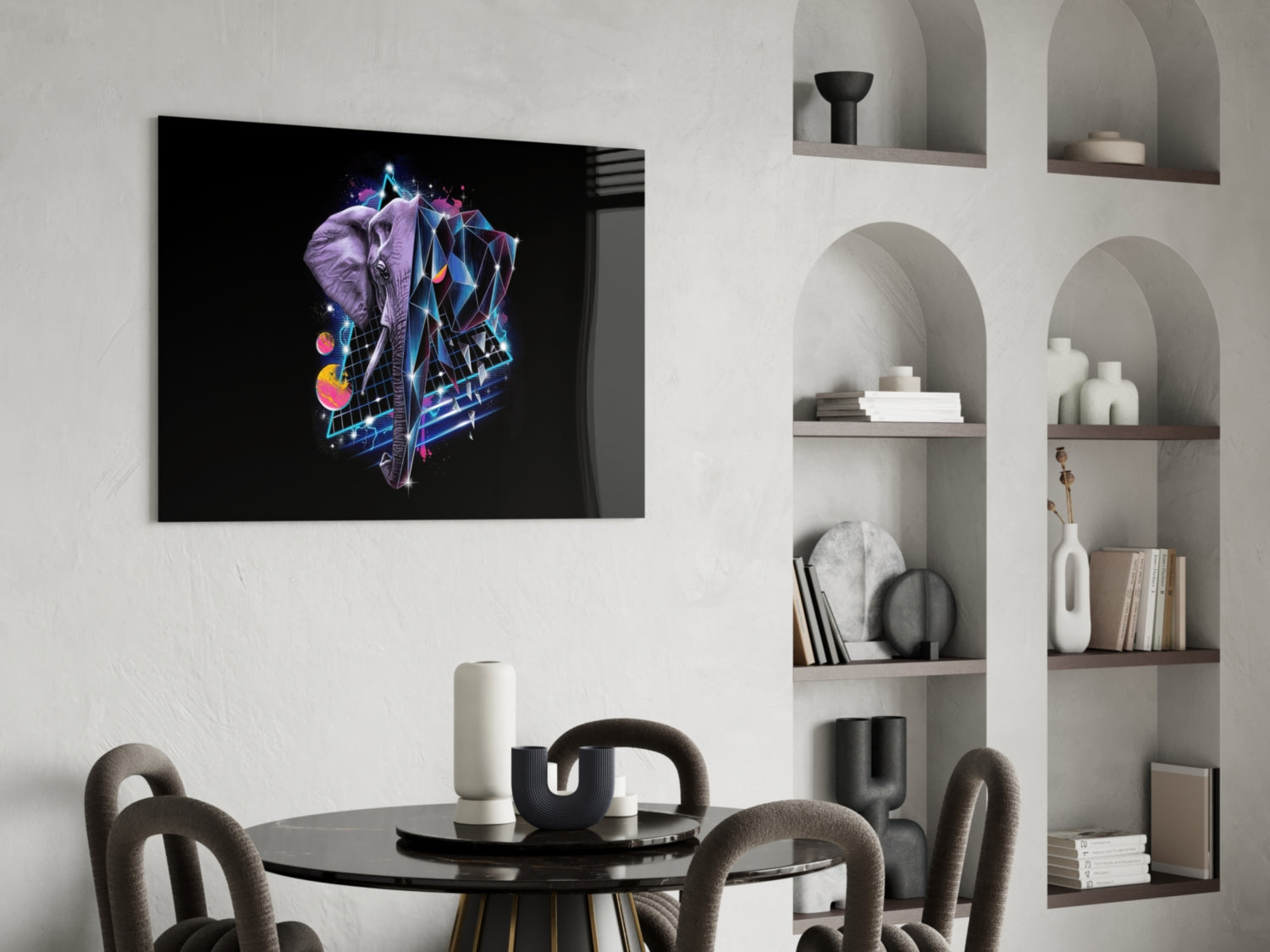 Neon elephant with geometric patterns and colorful orbs displayed on black glass mounted above a dining table in modern interior.