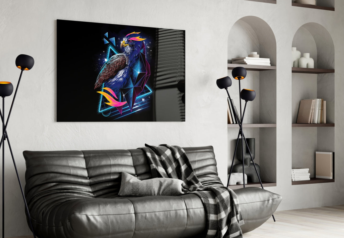 Neon eagle glass wall art hanging above gray leather sofa in modern living room with white shelving.