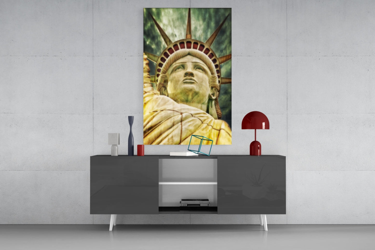 Statue of Liberty glass wall art displayed above a gray console table with red and white decorative accessories.