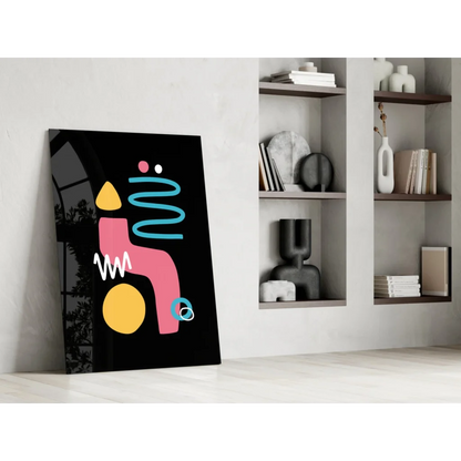 Black abstract glass wall art with bold pink, yellow, teal shapes