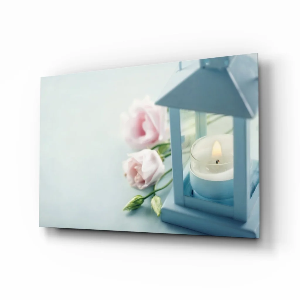 Light blue lantern with lit candle and pink roses glass wall art