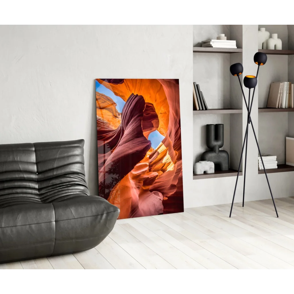 Fiery orange and red glass wall art of canyon wall against white backdrop