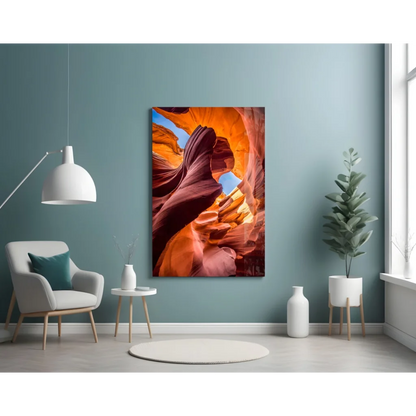 Fiery orange and red glass wall art of vibrant sandstone canyon on teal wall