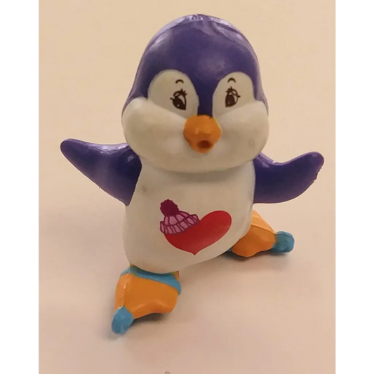 Care Bears Mini Cozy Heart Penguin toy with skates, purple white plastic