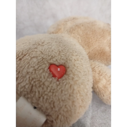Vintage 1983 Care Bears Tenderheart Bear plush with red heart patch